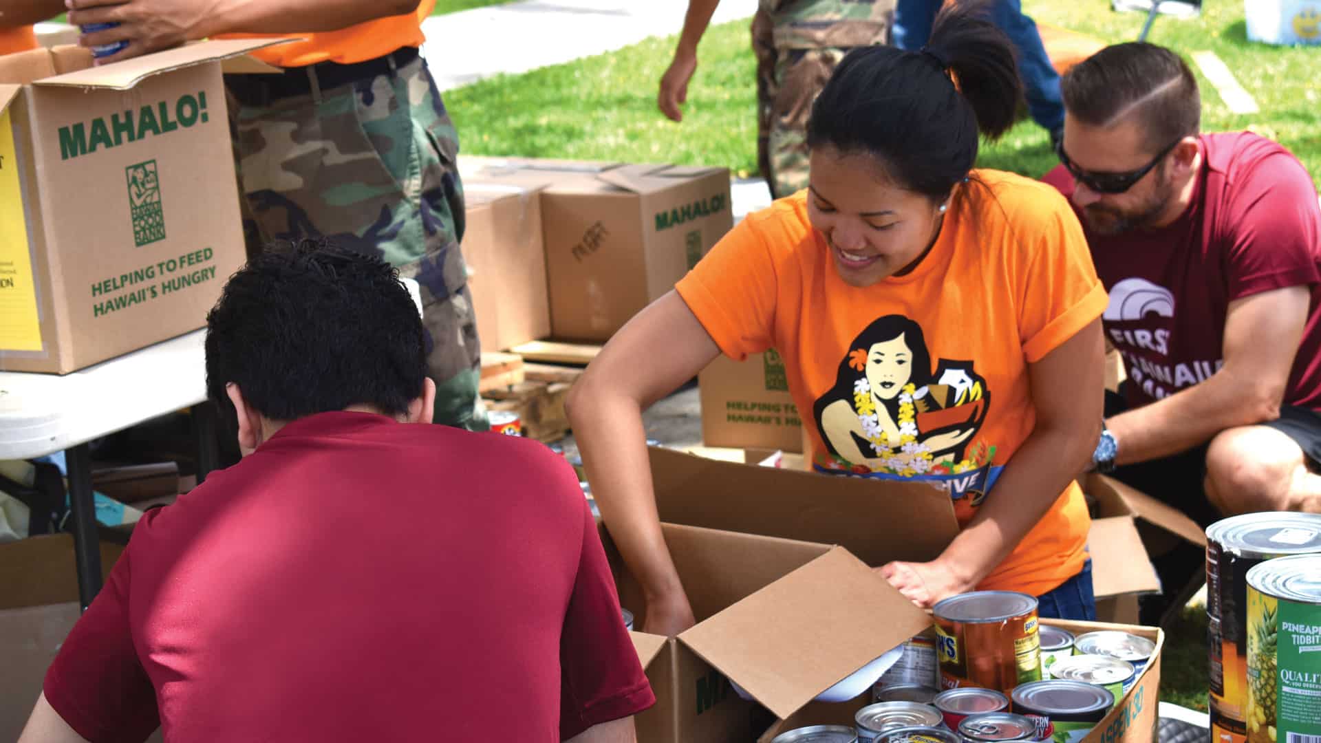 Volunteers in Oahu organizing a local food and fund drive to support Hawaii Foodbank’s mission.
